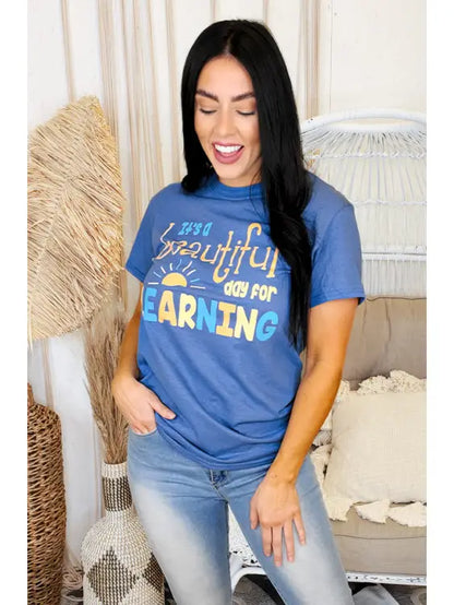 Blue "It's a Beautiful Day For Learning" graphic tee