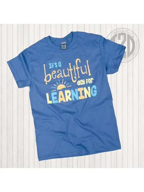 Blue "It's a Beautiful Day For Learning" graphic tee