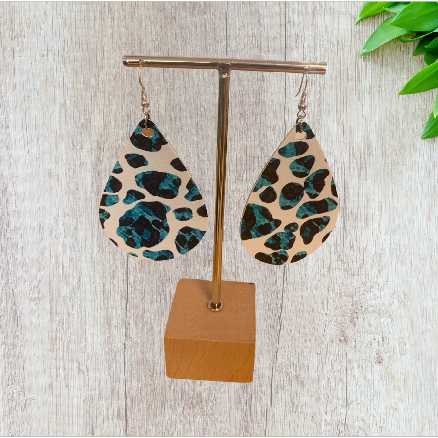 Turquoise & black leopard design teardrop shaped earrings